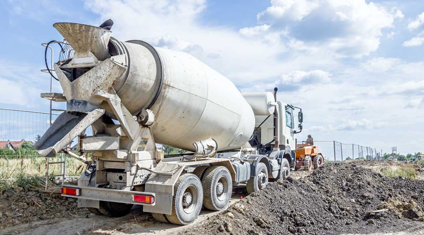 Commercial concrete services with mixer truck on site